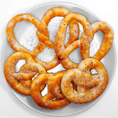 A top down view of some gluten free vavarian pretzels , ready to be consumed from the plate